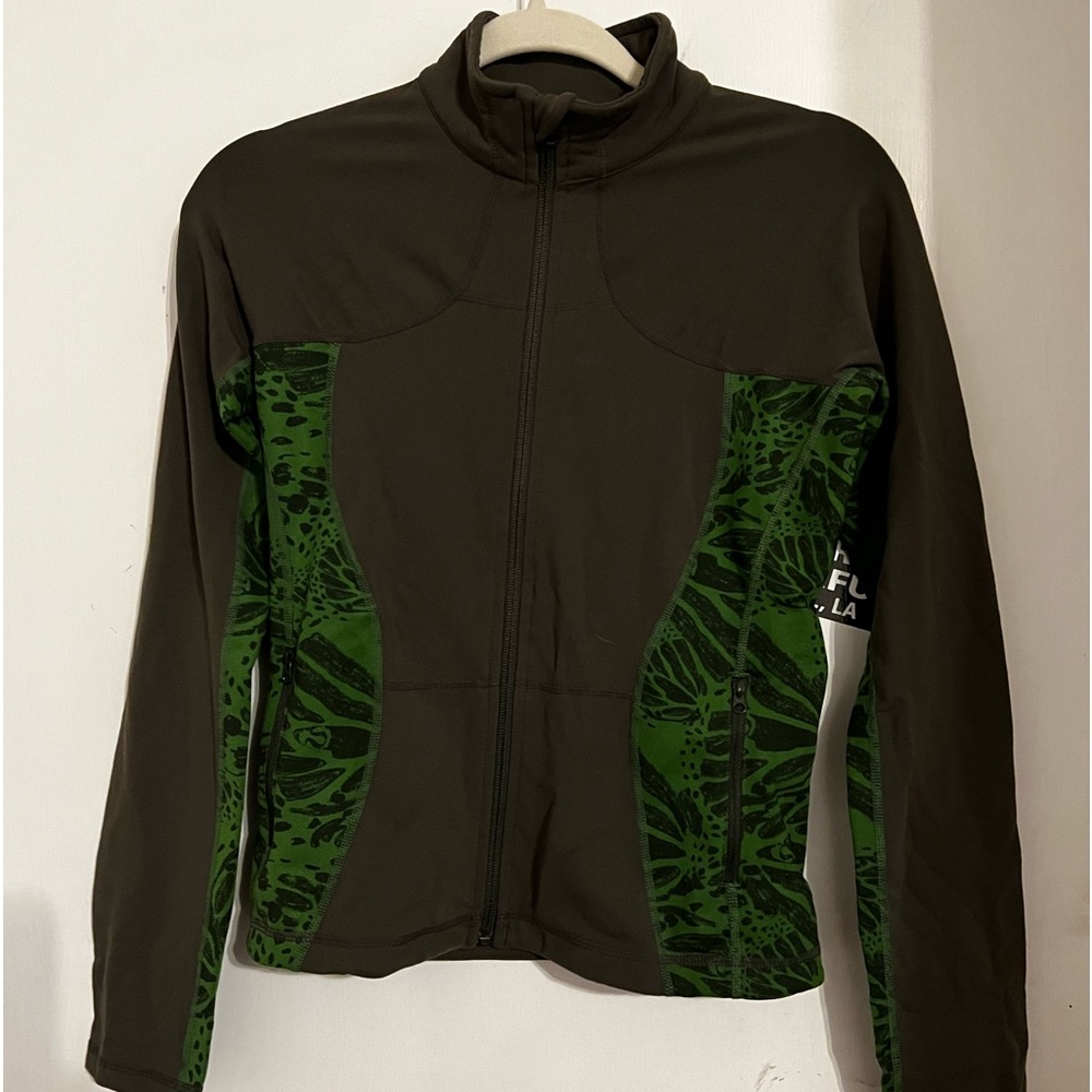 Size 6 Lululemon Jacket; zipper up the front; gently used. Perfect on cool days.